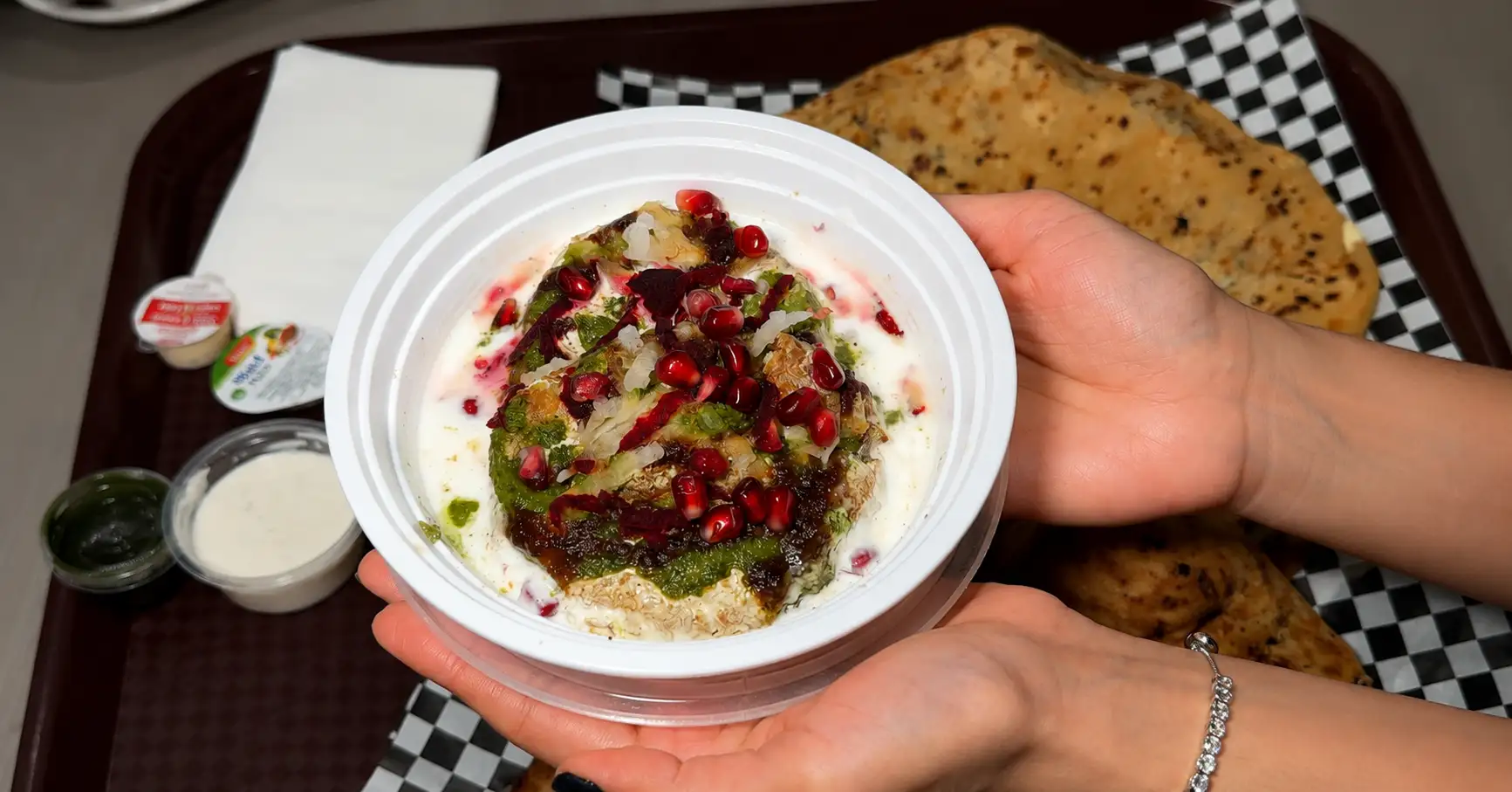 Authentic aloo tikki chaat with yogurt, chutneys and spices
